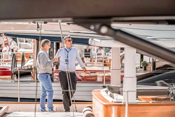 Two Men Standing On a Yacht at the Monaco Boat Show